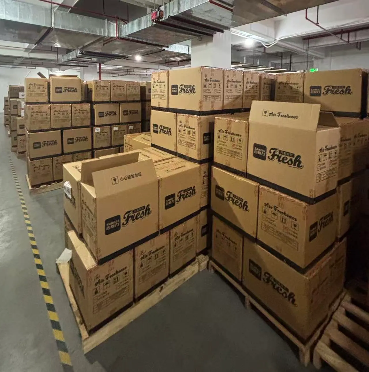Palletised shipping cartons stacked in a warehouse